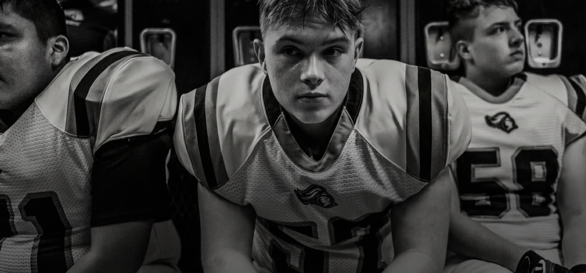 Football players in the locker room before a game
